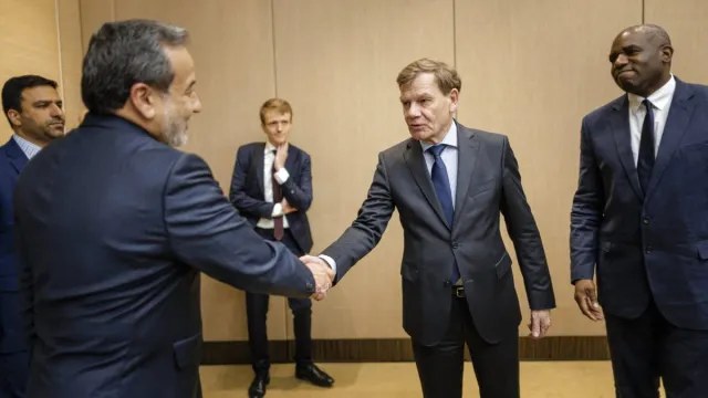 Britain’s David Lammy and Germany’s Johann Wadephul greet Iran’s Abbas Araghchi (Photo credit: AFP PHOTO/German Federal Foreign Office/HANDOUT)”