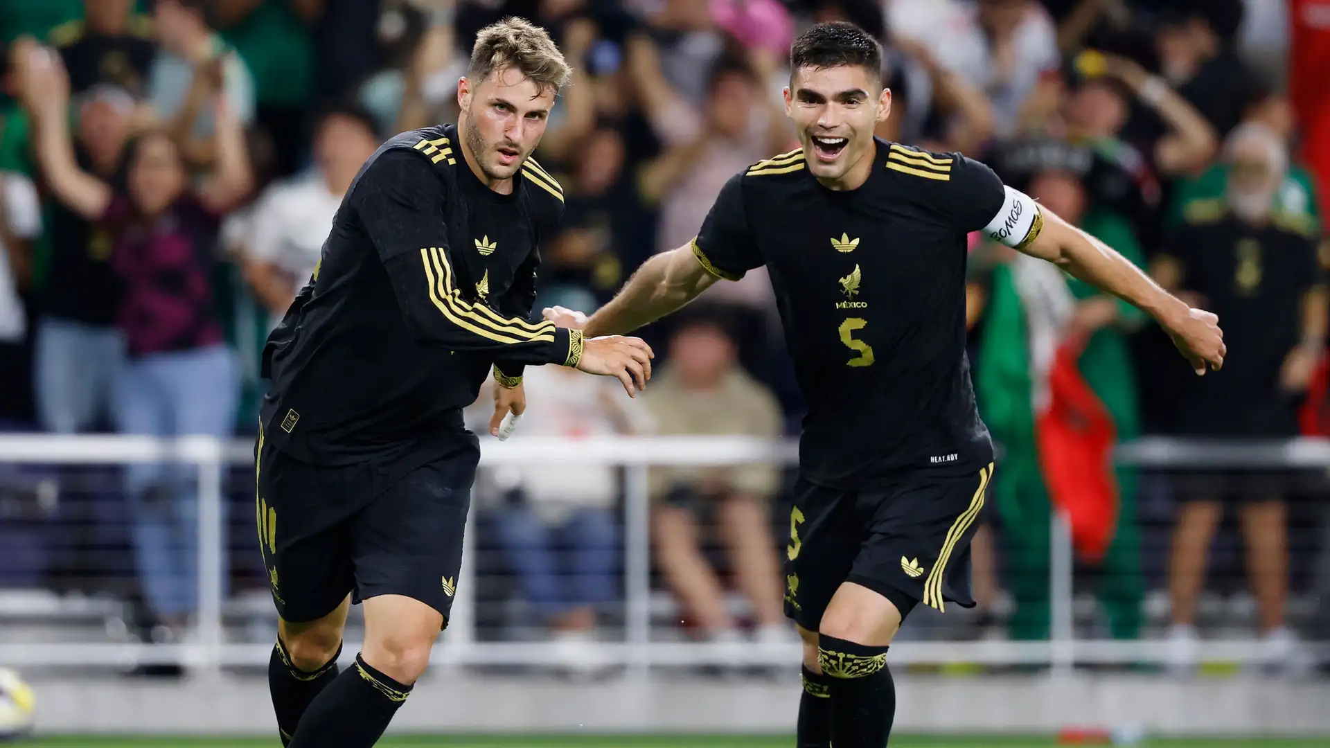 Santiago Giménez and Erik Lira