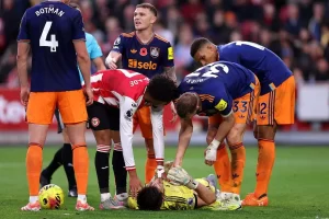 Nick Pope goes down with an injury against Brentford
